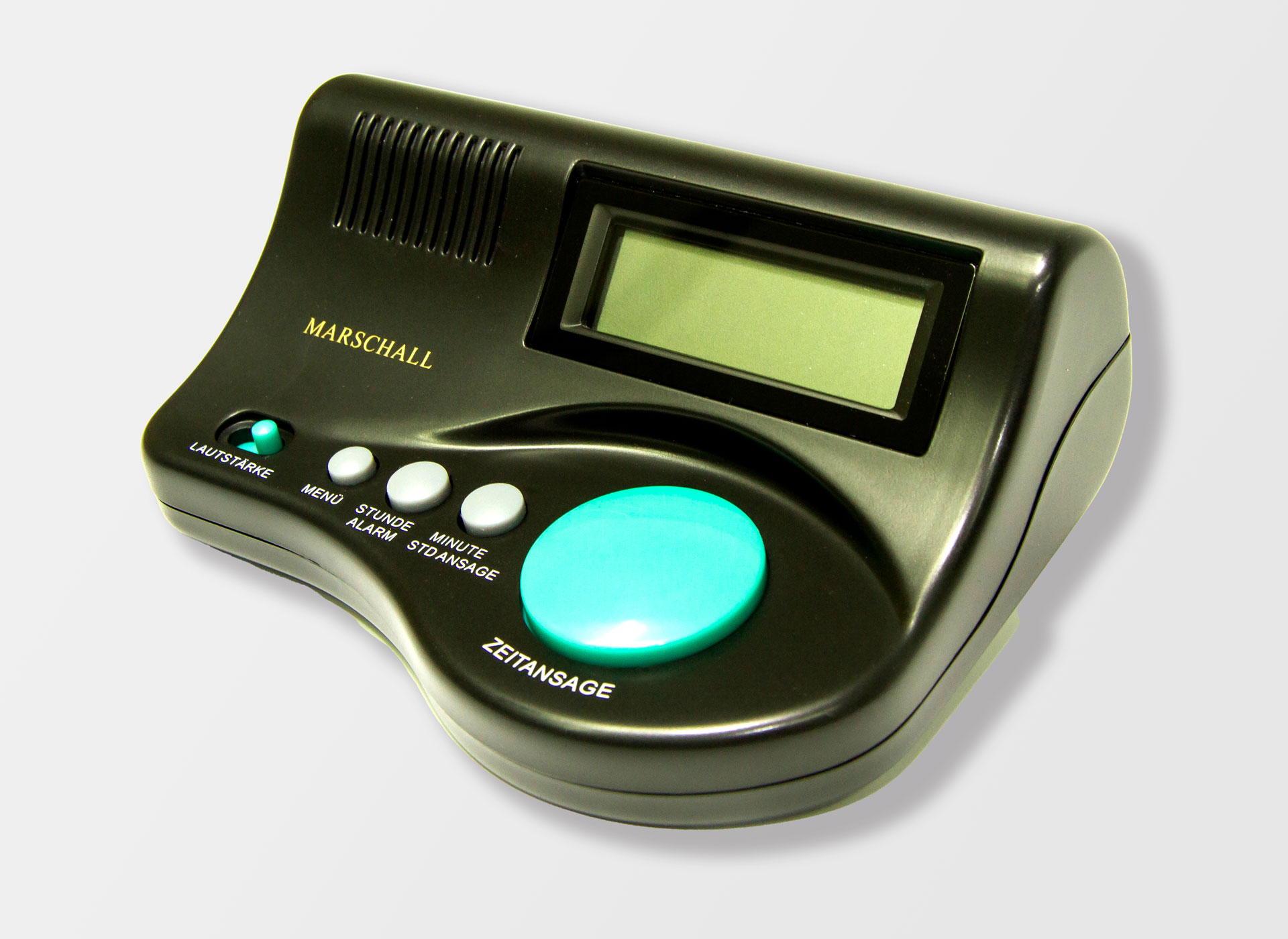 Ansicht auf den schwarzen Wecker mit grünem Knopf.