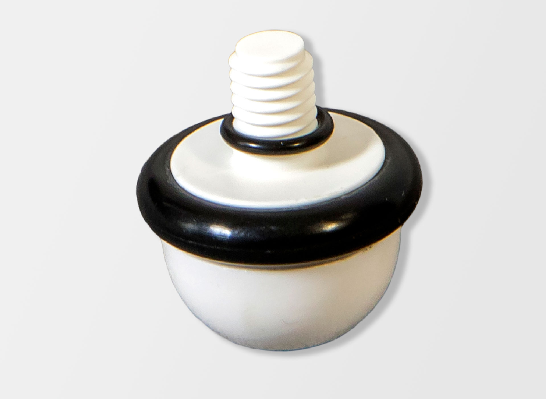 Ansicht auf eine weiße Rollspitze mit Gummiring für einen Blindenlangstock