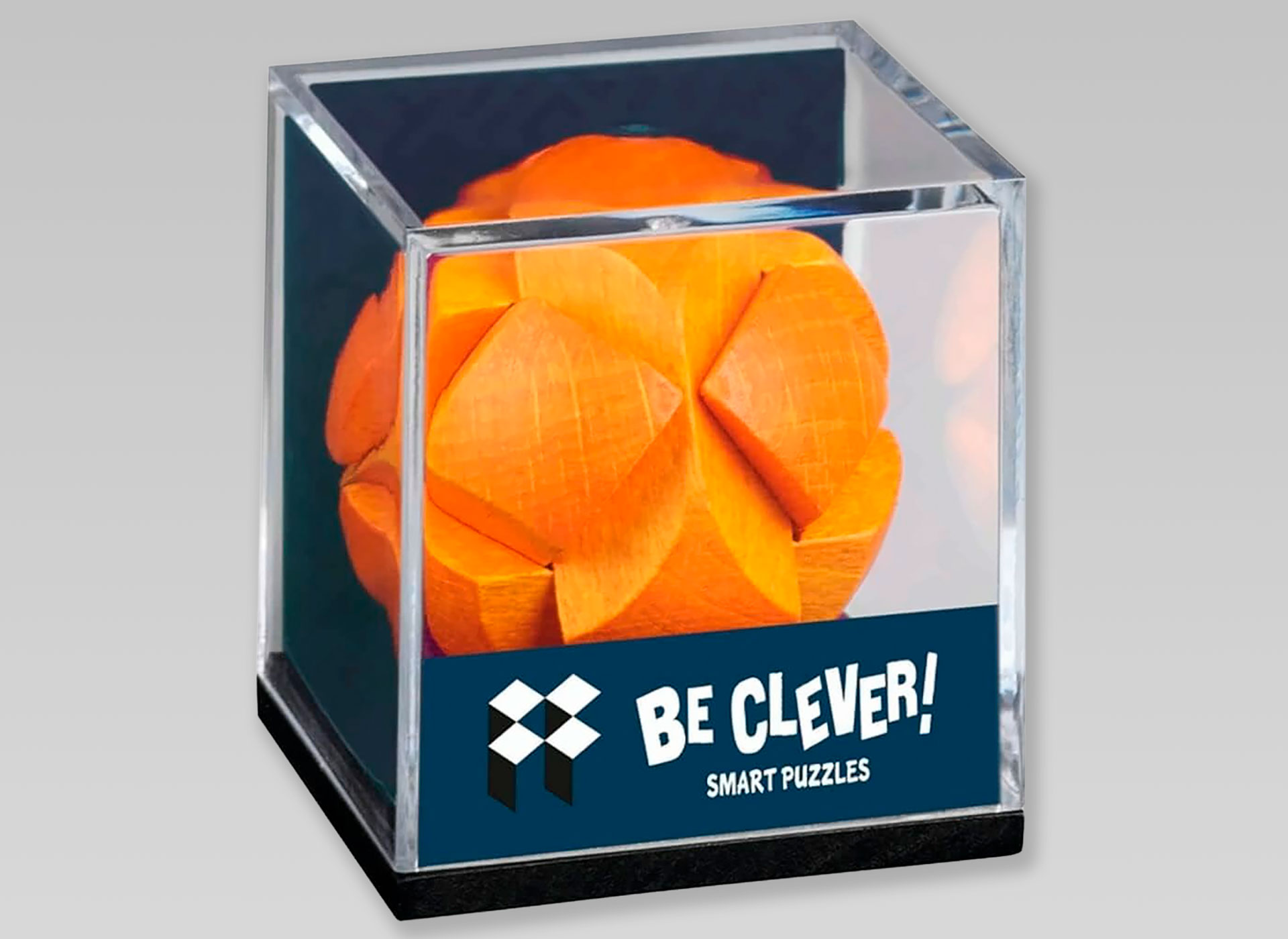 Ansicht auf einen orangefarbenen Ball in einer durchsichtigen Umrandung.