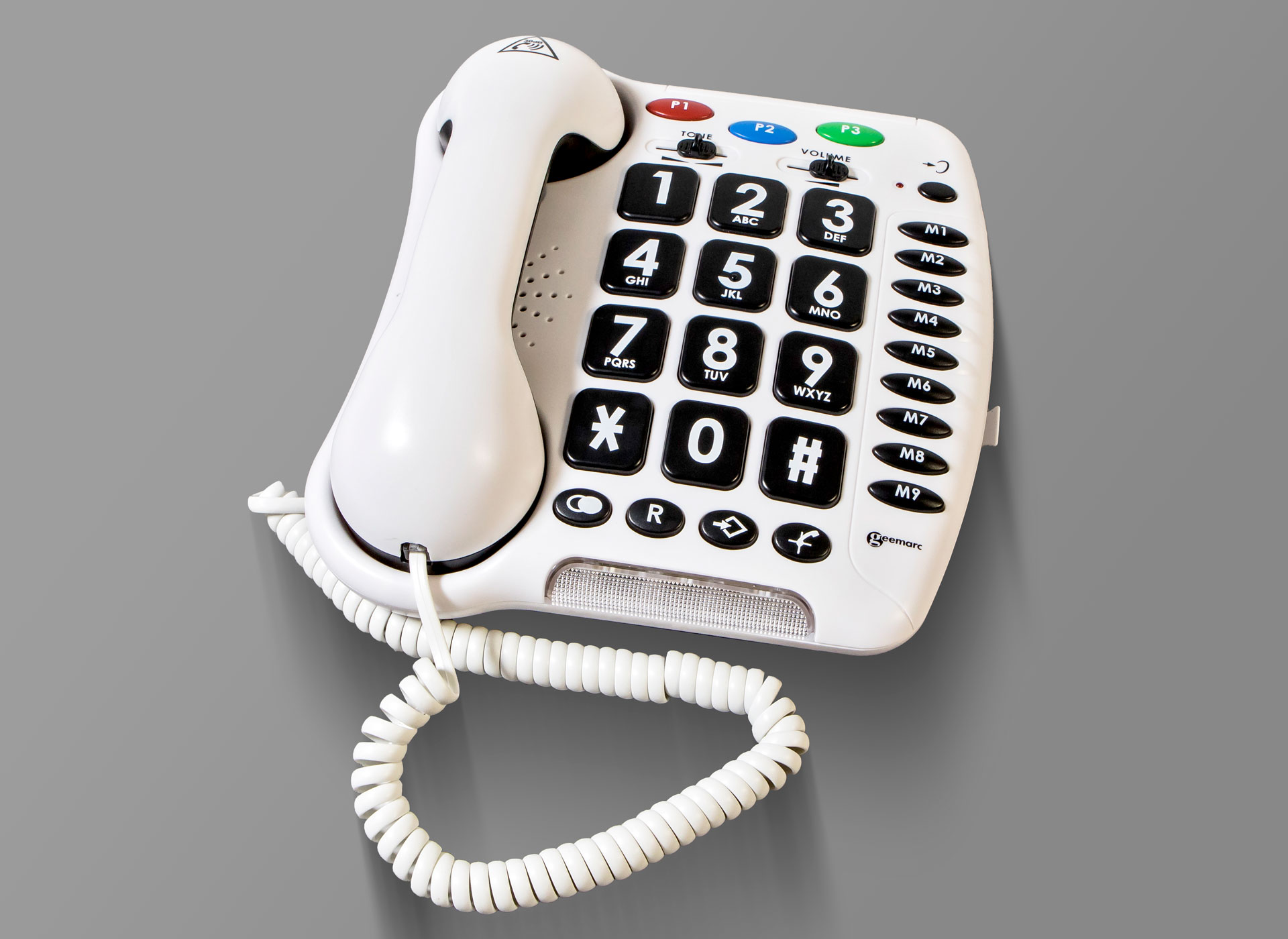 Ansicht auf das weiße Telefon mit großen schwarzen Tasten.