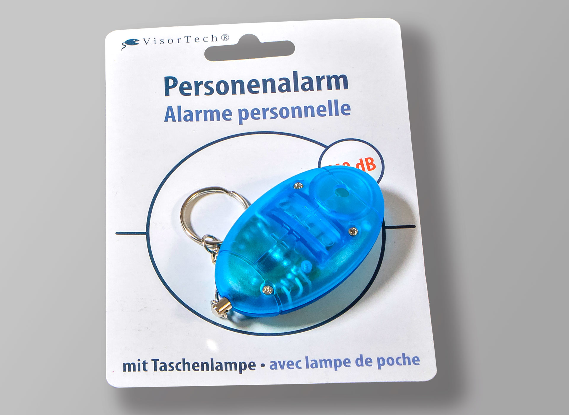 Ansicht auf den eingepackten Schlüsselanhänger. Er ist hellblau.